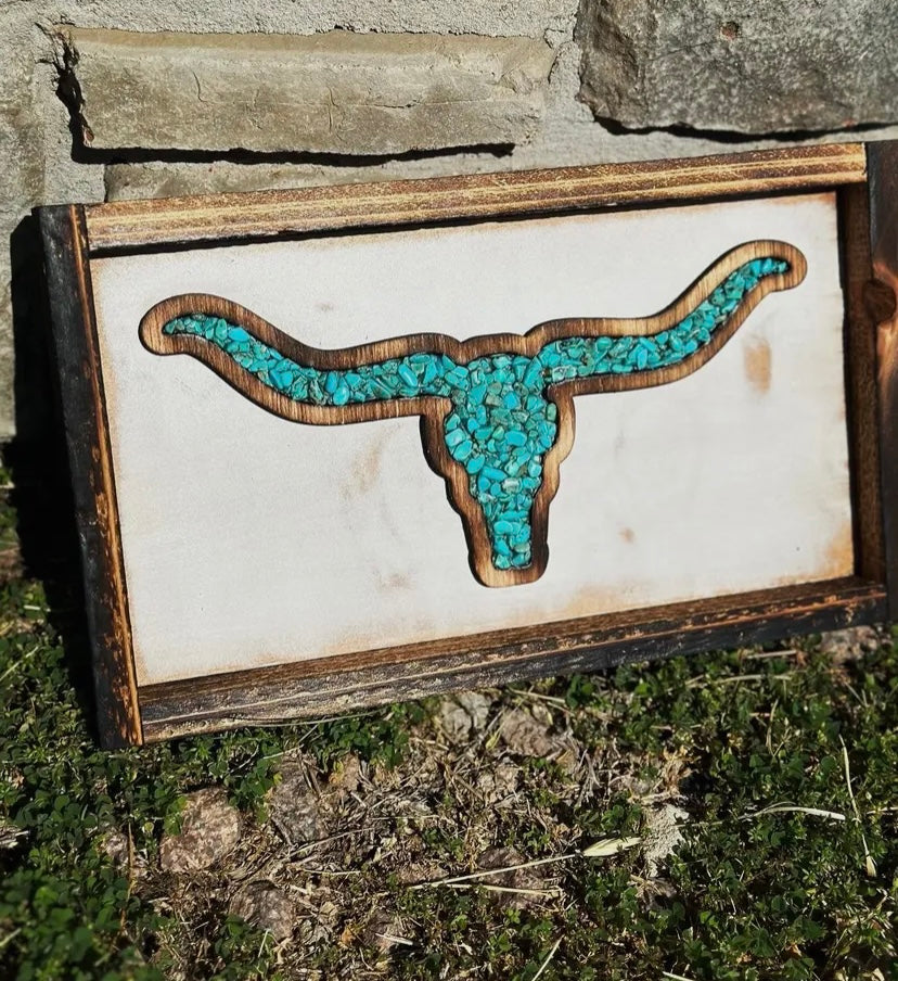 White washed turquoise sign